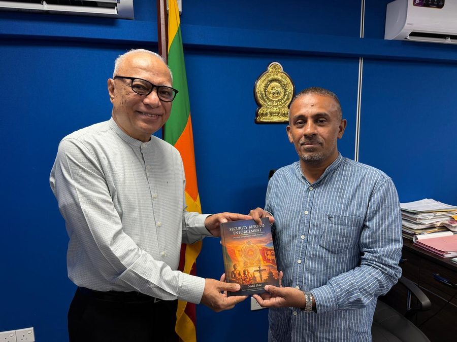 Mahil Dole handing over Security Beyond Enforcement to the Hon. Deputy Minister of Muslim Religious Affairs