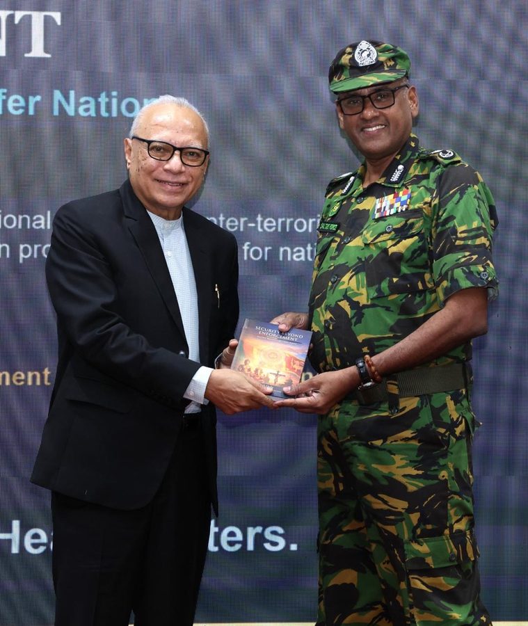 Mahil Dole presenting Security Beyond Enforcement to the Commandant of the Special Task Force at STF Headquarters